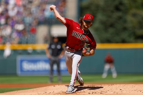 DENVER, CO – SEPTEMBER 11: Starting pitcher Zac Gallen #23 of the Arizona Diamondbacks delivers to home plate in the first inning against the Colorado Rockies at Coors Field on September 11, 2022 in Denver, Colorado. Gallen set a team record for consecutive scoreless innings at 42.1. (Photo by Justin Edmonds/Getty Images)