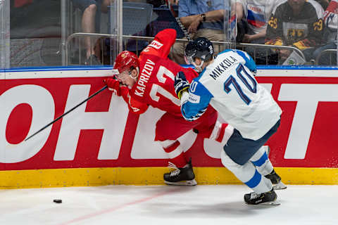 BRATISLAVA, SLOVAKIA – MAY 25: #77 Kirill Kaprizov of Russia vies with #70 Niko Mikkola of Finland during the 2019 IIHF Ice Hockey World Championship Slovakia semi final game between Russia and Finland at Ondrej Nepela Arena on May 25, 2019 in Bratislava, Slovakia. (Photo by RvS.Media/Robert Hradil/Getty Images)