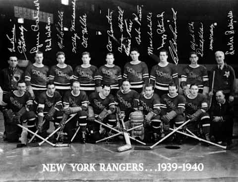 The 1939 New York Rangers pose for the team portrait with goalie Dave Kerr (Photo by B Bennett/Getty Images)