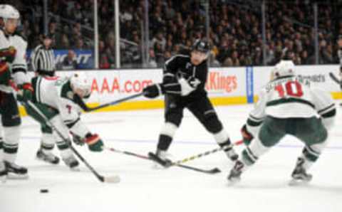 Los Angeles Kings left wing Tanner Pearson (70) shoots against Minnesota Wild defense (Gary A. Vasquez-USA TODAY Sports)