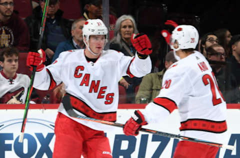 GLENDALE, ARIZONA – FEBRUARY 06: Andrei Svechnikov #37 of the Carolina Hurricanes celebrates with teammate Sebastian Aho #20 of the Hurricanes after scoring a goal against the Arizona Coyotes during the second period of the NHL hockey game at Gila River Arena on February 06, 2020 in Glendale, Arizona. (Photo by Norm Hall/NHLI via Getty Images)