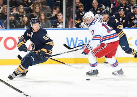 BUFFALO, NY – FEBRUARY 15: Jeff Skinner #53 of the Buffalo Sabres and Kevin Hayes #13 of the New York Rangers battle for the puck during an NHL game on February 15, 2019 at KeyBank Center in Buffalo, New York. New York won, 6-2. (Photo by Joe Hrycych/NHLI via Getty Images)