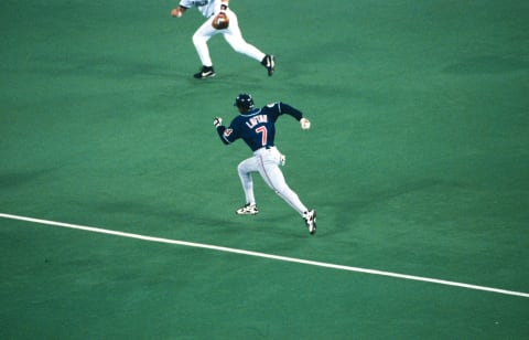 PHILADELPHIA, PA – JULY 9: Kenny Lofton #7 of the Cleveland Indians steals second base during the 67th MLB All-Star game against the National League at Veterans Stadium on Tuesday, July 9, 1996 in Philadelphia, Pennsylvania. (Photo by Michael Zagaris/MLB Photos)