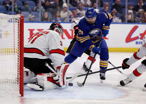 Apr 5, 2022; Buffalo, New York, USA; Carolina Hurricanes goaltender Frederik Andersen (31) makes a save on Buffalo Sabres center Vinnie Hinostroza (29) during the second period at KeyBank Center. Mandatory Credit: Timothy T. Ludwig-USA TODAY Sports