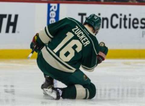 Jan 8, 2015; Saint Paul, MN, USA; Minnesota Wild forward Jason Zucker (16) celebrates his goal during the second period against the Chicago Blackhawks at Xcel Energy Center. Mandatory Credit: Brace Hemmelgarn-USA TODAY Sports