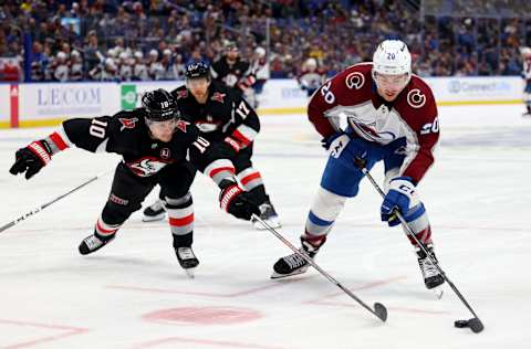 Oct 29, 2023; Buffalo, New York, USA; Buffalo Sabres defenseman Henri Jokiharju (10) tries to block a shot by Colorado Avalanche center Ross Colton (20) during the third period at KeyBank Center. Mandatory Credit: Timothy T. Ludwig-USA TODAY Sports