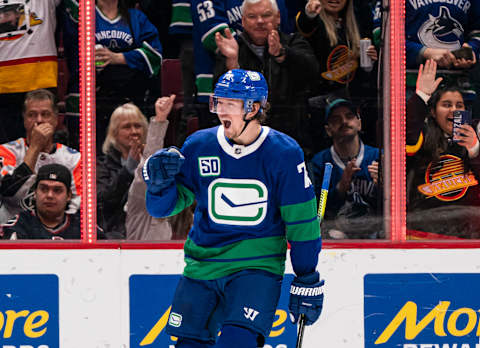 VANCOUVER, BC – FEBRUARY 22: Tyler Toffoli #73 of the Vancouver Canucks celebrates after scoring a goal (Photo by Rich Lam/Getty Images)