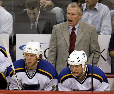 PITTSBURGH – DECEMBER 19: Andy Murray head coach of the St. Louis Blues reacts to a play from behind the bench during a game against the Pittsburgh Penguins on December 19, 2006 at Mellon Arena in Pittsburgh, Pennsylvania. The Blues defeated the Penguins 4-1. (Photo by Gregory Shamus/Getty Images)