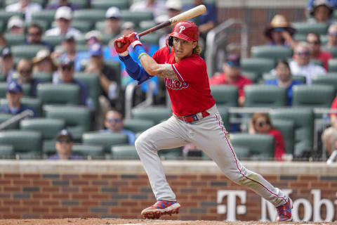 Sep 20, 2023; Cumberland, Georgia, USA; Philadelphia Phillies second baseman Bryson Stott (5) doubles to drive in two runs against the Atlanta Braves during the tenth inning at Truist Park. Mandatory Credit: Dale Zanine-USA TODAY Sports