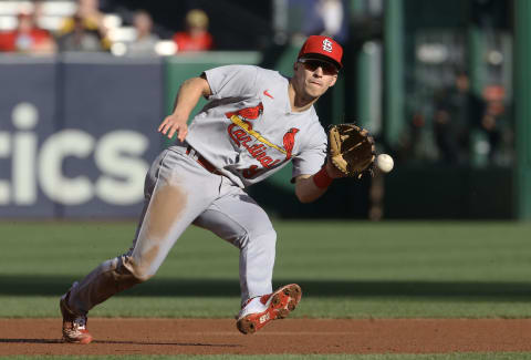 Oct 5, 2022; Pittsburgh, Pennsylvania, USA; St. Louis Cardinals shortstop Tommy Edman (19) fields a ground ball for an out against the Pittsburgh Pirates during the first inning at PNC Park. Mandatory Credit: Charles LeClaire-USA TODAY Sports