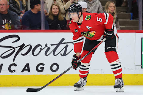 CHICAGO, ILLINOIS – NOVEMBER 05: Connor Murphy #5 of the Chicago Blackhawks looks on against the New Jersey Devils during the first period at the United Center on November 05, 2023 in Chicago, Illinois. (Photo by Michael Reaves/Getty Images)