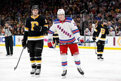 BOSTON, MA – NOVEMBER 29: Boston Bruins right defenseman Brandon Carlo (25) and New York Rangers right wing Kaapo Kakko (24) skate out for a shift during a game between the Boston Bruins and the New York Rangers on November 29, 2019, at TD Garden in Boston, Massachusetts. (Photo by Fred Kfoury III/Icon Sportswire via Getty Images)