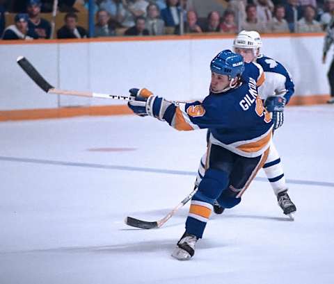 TORONTO, ON – APRIL 28 : Doug Gilmour #9 of the St. Louis Blues skates against the Toronto Maple Leafs during NHL Stanley Cup game action on April 28, 1986 at Maple Leaf Gardens in Toronto, Ontario Canada. (Photo by Graig Abel/Getty Images)