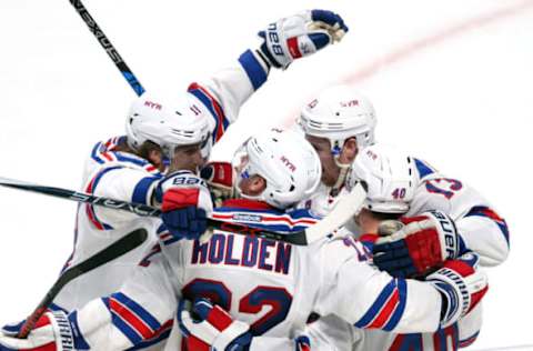 Apr 12, 2017; Montreal, Quebec, CAN; New York Rangers right wing Michael Grabner (40) celebrates his goal against Montreal Canadiens with teammates during the third period of game one of the first round of the 2017 Stanley Cup Playoffs at Bell Centre. Mandatory Credit: Jean-Yves Ahern-USA TODAY Sports