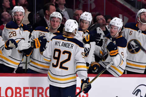 Mar 23, 2019; Montreal, Quebec, CAN; Buffalo Sabres forward Alexander Nylander (92) reacts with teammates after scoring a goal against the Montreal Canadiens during the second period at the Bell Centre. Mandatory Credit: Eric Bolte-USA TODAY Sports