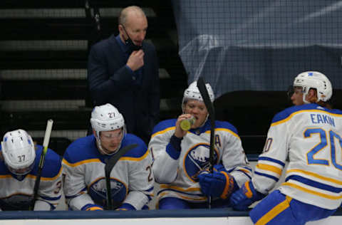 Mar 7, 2021; Uniondale, New York, USA; Buffalo Sabres head coach Ralph Krueger talks to his players during the first period against the New York Islanders at Nassau Veterans Memorial Coliseum. Mandatory Credit: Brad Penner-USA TODAY Sports