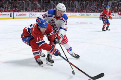 MONTREAL, QC – DECEMBER 1: Brendan Gallagher #11 of the Montreal Canadiens fights for the puck against Jimmy Vesey #26 of the New York Rangers in the NHL game at the Bell Centre on December 1, 2018 in Montreal, Quebec, Canada. (Photo by Francois Lacasse/NHLI via Getty Images)