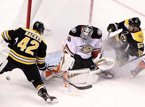 BOSTON – JANUARY 30: Boston Bruins’ David Backes (42) can’t get to a rebound off a shot as Anaheim Ducks goaltender John Gibson (36) makes the save during the second period. The Boston Bruins host the Anaheim Ducks in a regular season NHL hockey game at TD Garden in Boston on Jan. 30, 2018. (Photo by Barry Chin/The Boston Globe via Getty Images)