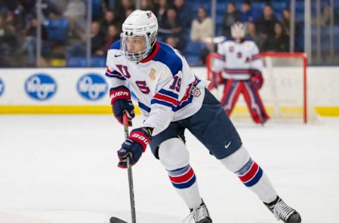 PLYMOUTH, MI – FEBRUARY 16: K’Andre Miller #19 of the USA Nationals controls the puck during the 2018 Under-18 Five Nations Tournament. (Photo by Dave Reginek/Getty Images)