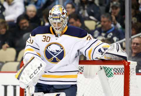 Jan 27, 2014; Pittsburgh, PA, USA; Buffalo Sabres goalie Ryan Miller (30) looks down during the third period against the Pittsburgh Penguins at Consol Energy Center. Penguins beat the Sabres 3-0. Mandatory Credit: Raj Mehta-USA TODAY Sports