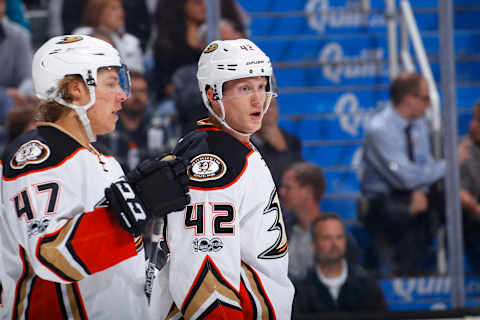 Hampus Lindholm #47 and Josh Manson #42 of the Anaheim Ducks (Photo by Rocky W. Widner/NHL/Getty Images)