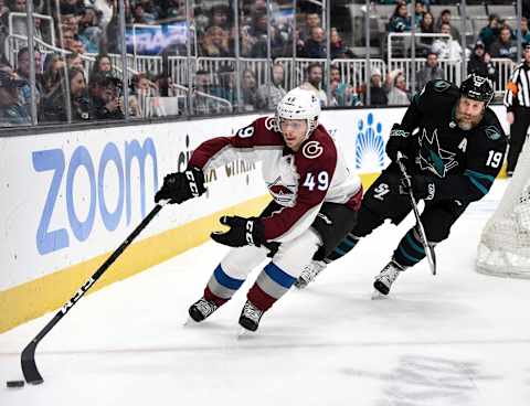 SAN JOSE, CA – MARCH 01: Samuel Girard #49 of the Colorado Avalanche skates with the puck against Joe Thornton #19 of the San Jose Sharks at SAP Center on March 1, 2019 in San Jose, California (Photo by Brandon Magnus/NHLI via Getty Images)