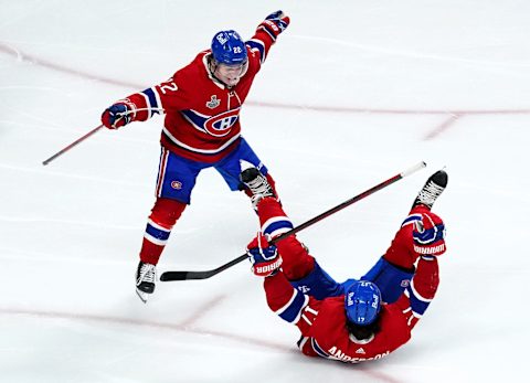 MONTREAL, QUEBEC – JULY 05: Josh Anderson #17 of the Montreal Canadiens celebrates with Cole Caufield #22 after scoring the game-winning goal to give his team the 3-2 win against the Tampa Bay Lightning during the first overtime period in Game Four of the 2021 NHL Stanley Cup Final at the Bell Centre on July 05, 2021 in Montreal, Quebec, Canada. (Photo by Andre Ringuette/Getty Images)