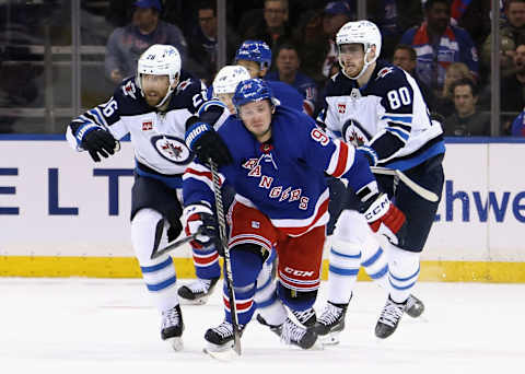 NEW YORK, NEW YORK – FEBRUARY 20: Blake Wheeler #26 and Pierre-Luc Dubois #80 of the Winnipeg Jets slow down Vladimir Tarasenko #91 of the New York Rangers during the second period at Madison Square Garden on February 20, 2023, in New York City. (Photo by Bruce Bennett/Getty Images)