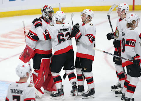 Evgenii Dadonov #63 and Erik Brannstrom #26 of the Ottawa Senators (Photo by Jason Halstead/Getty Images)