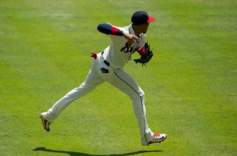 ATLANTA, GA – JUNE 3: Johan Camargo #17 of the Atlanta Braves throws to first against the Washington Nationals at SunTrust Park on June 3, 2018 in Atlanta, Georgia. The Braves defeated the Nationals 4-2. (Photo by Carl Fonticella/Beam Imagination/Atlanta Braves/Getty Images)