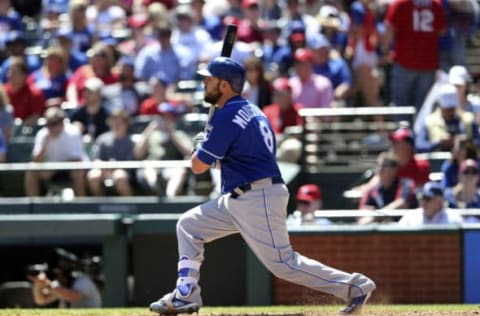 Apr 23, 2017; Arlington, TX, USA; Kansas City Royals designated hitter Mike Moustakas (8) hits a home run during the third inning against the Texas Rangers at Globe Life Park in Arlington. Mandatory Credit: Kevin Jairaj-USA TODAY Sports