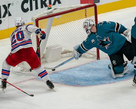 New York Rangers left wing Chris Kreider (20) scores during the third period against San Jose Sharks goaltender Aaron Dell (30) Mandatory Credit: Neville E. Guard-USA TODAY Sports