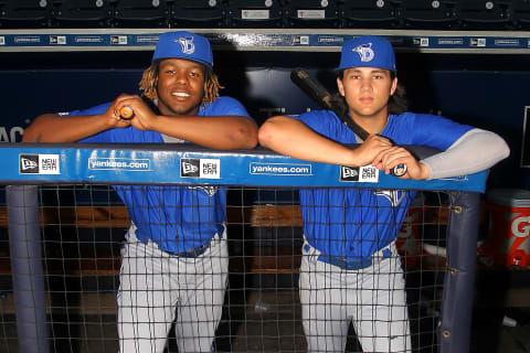 TAMPA, FL – JULY 12: Blue Jays prospects Vladimir Guerrero Jr. and Bo Bichette pose together before the Florida State League game between the Dunedin Blue Jays and the Tampa Yankees on July 12, 2017, at Steinbrenner Field in Tampa, FL. Guerrero and Bichette are both sons of former all-star big leaguers, Vladdy’s father is Vladimir Guerrero and Bo’s father is Dante Bichette. (Photo by Cliff Welch/Icon Sportswire via Getty Images)