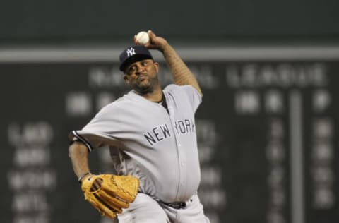 Sep 18, 2016; Boston, MA, USA; New York Yankees starting pitcher CC Sabathia (52) pitches during the first inning against the Boston Red Sox at Fenway Park. Mandatory Credit: Bob DeChiara-USA TODAY Sports