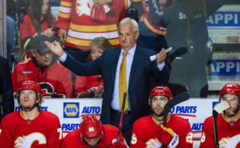 May 26, 2022; Calgary, Alberta, CAN; Calgary Flames head coach Darryl Sutter on his bench against the Edmonton Oilers during the third period in game five of the second round of the 2022 Stanley Cup Playoffs at Scotiabank Saddledome. Mandatory Credit: Sergei Belski-USA TODAY Sports