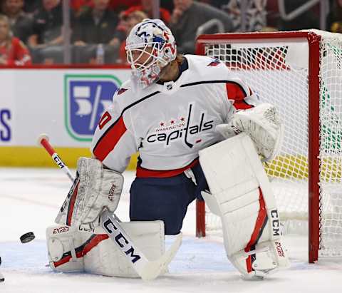 CHICAGO, ILLINOIS – SEPTEMBER 25: Braden Holtby #70 of the Washington Capitals makes a save against the Chicago Blackhawks during a preseason game at the United Center on September 25, 2019 in Chicago, Illinois. (Photo by Jonathan Daniel/Getty Images)