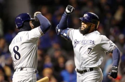 Apr 17, 2017; Chicago, IL, USA; Milwaukee Brewers first baseman Eric Thames (7) celebrates his home run with left fielder Ryan Braun (8) during the third inning of the game against the Chicago Cubs at Wrigley Field. Mandatory Credit: Caylor Arnold-USA TODAY Sports