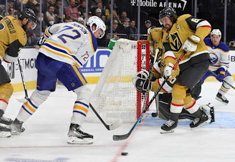 LAS VEGAS, NEVADA – FEBRUARY 01: Tage Thompson #72 of the Buffalo Sabres and Mark Stone #61 of the Vegas Golden Knights vie for the puck in the first period of their game at T-Mobile Arena on February 1, 2022 in Las Vegas, Nevada. The Golden Knights defeated the Sabres 5-2. (Photo by Ethan Miller/Getty Images)