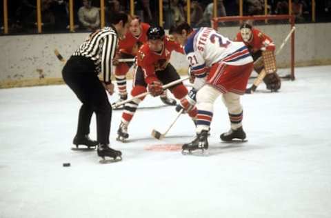 Pete Stemkowski #21 of the New York Rangers follows the puck after the face-off .(Photo by Melchior DiGiacomo/Getty Images)