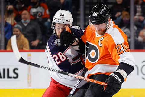 PHILADELPHIA, PENNSYLVANIA – JANUARY 20: Oliver Bjorkstrand #28 of the Columbus Blue Jackets and Claude Giroux #28 o . (Photo by Tim Nwachukwu/Getty Images)