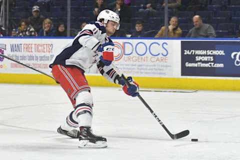 BRIDGEPORT, CT – JANUARY 12: Ryan Gropp #11 of the Hartford Wolf Pack shoots and scores during a game against the Bridgeport Sound Tigers at the Webster Bank Arena on January 12, 2019 in Bridgeport, Connecticut. (Photo by Gregory Vasil/Getty Images)