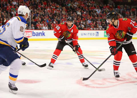 Apr 7, 2016; Chicago, IL, USA; Chicago Blackhawks right wing Patrick Kane (88) leads a charge with left wing Artemi Panarin (72) against St. Louis Blues center Paul Stastny (26) during the first period at the United Center. Mandatory Credit: Dennis Wierzbicki-USA TODAY Sports