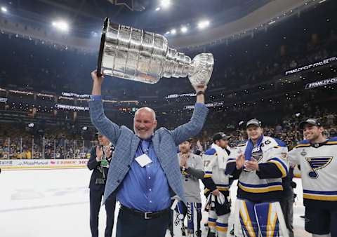 Doug Armstrong, General Manager of St. Louis Blues Hoists the Stanley Cup following their 2019 victory (Photo by Bruce Bennett/Getty Images)