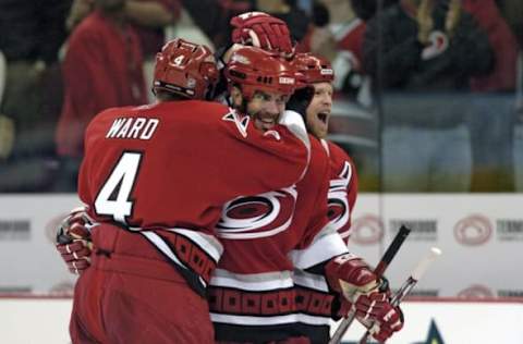 Aaron Ward, Niclas Wallin, Glen Wesley, Carolina Hurricanes (Photo by Grant Halverson/Getty Images)