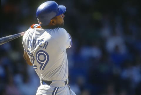 NEW YORK – CIRCA 1991: Joe Carter #29 of the Toronto Blue Jays bats against the New York Yankees during an Major League Baseball game circa 1991 at Yankee Stadium in the Bronx borough of New York City. Carter played for the Blue Jays from 1991-97. (Photo by Focus on Sport/Getty Images)