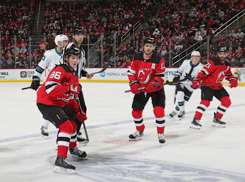 Jack Hughes #86 and Nico Hischier #13 of the New Jersey Devils (Photo by Bruce Bennett/Getty Images)