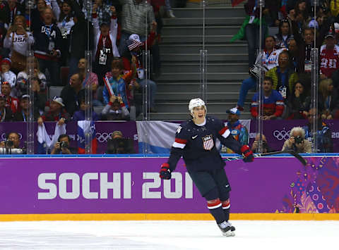 SOCHI, RUSSIA – FEBRUARY 15: T.J. Oshie #74 of the United States celebrates after scoring on a shootout against Sergei Bobrovski #72 of Russia to win the Men’s Ice Hockey Preliminary Round Group A game on day eight of the Sochi 2014 Winter Olympics at Bolshoy Ice Dome on February 15, 2014 in Sochi, Russia. (Photo by Streeter Lecka/Getty Images)