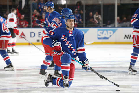 NEW YORK, NY – FEBRUARY 23: Chris Kreider #20 of the New York Rangers stretches during warmups before the game against the New Jersey Devils at Madison Square Garden on February 23, 2019 in New York City. (Photo by Jared Silber/NHLI via Getty Images)