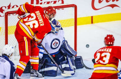 Dec 10, 2016; Calgary, Alberta, CAN; Winnipeg Jets goalie Michael Hutchinson (34) makes a save against the Calgary Flames during the first period at Scotiabank Saddledome. Mandatory Credit: Sergei Belski-USA TODAY Sports