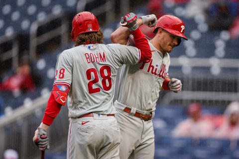 Oct 2, 2022; Washington, District of Columbia, USA; Philadelphia Phillies catcher J.T. Realmuto (10) celebrates with third baseman Alec Bohm (28) after hitting a home run against the Washington Nationals during the sixth inning at Nationals Park. Mandatory Credit: Scott Taetsch-USA TODAY Sports